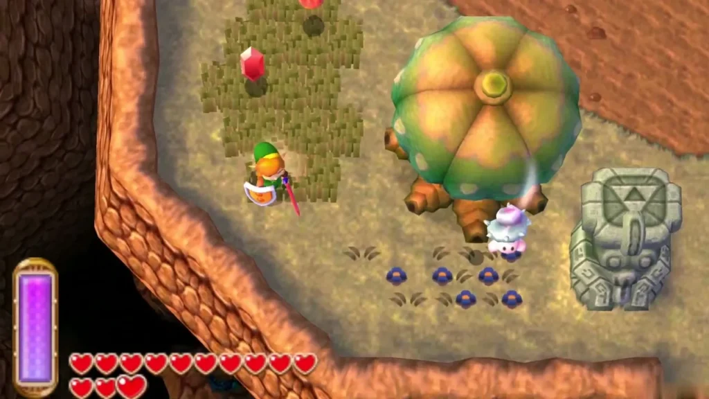 Link on olive ground beside a round tree with a stone face statue, a lost Maiamai dropping from the tree Link on olive ground beside a round tree with a stone face statue, a lost Maiamai dropping from the tree