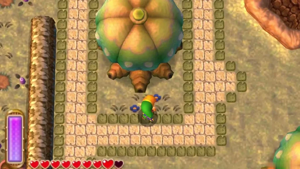 Link standing below a large round tree inside a walled square of cobbled paths in Lorule Link standing below a large round tree inside a walled square of cobbled paths in Lorule