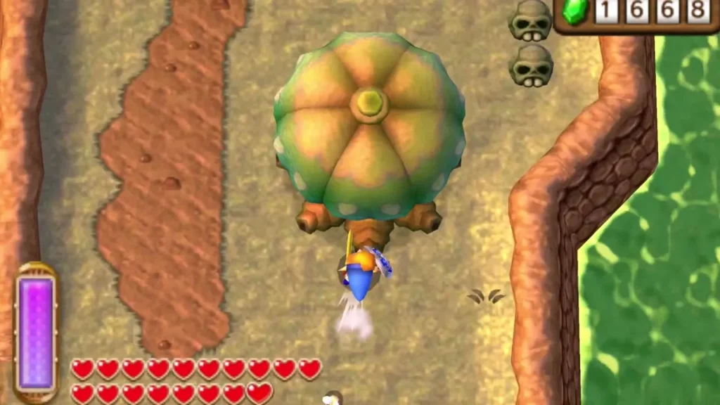Link dashing north into a lone round tree on a sandy path beside green water, skulls on the ledge above Link dashing north into a lone round tree on a sandy path beside green water, skulls on the ledge above