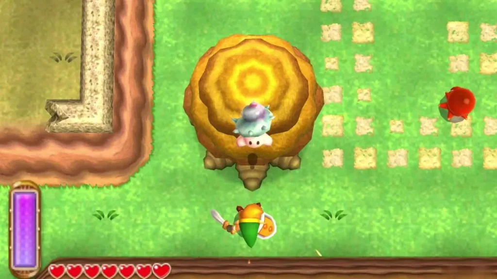 Link with his sword drawn below a large yellow tree as a Maiamai tumbles out of its top Link with his sword drawn below a large yellow tree as a Maiamai tumbles out of its top