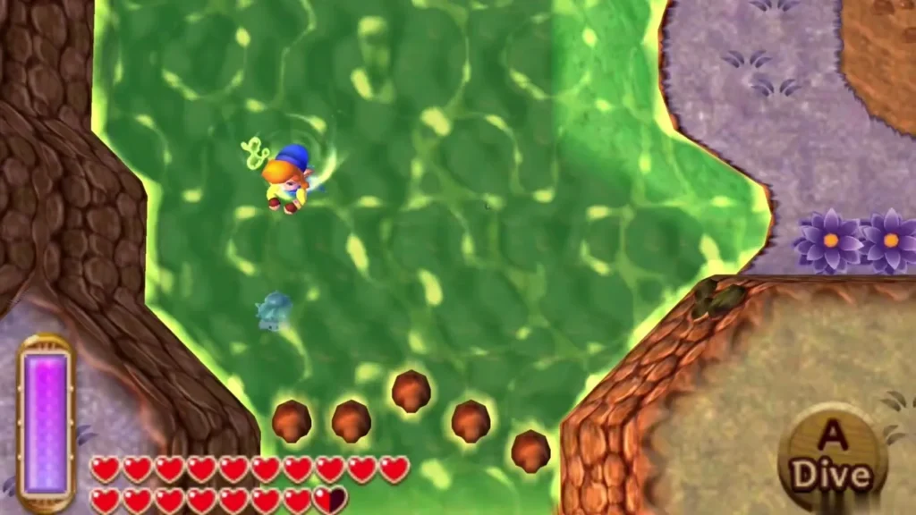 Link swimming in green Lorule water beside a row of brown stumps, the Dive prompt on screen Link swimming in green Lorule water beside a row of brown stumps, the Dive prompt on screen