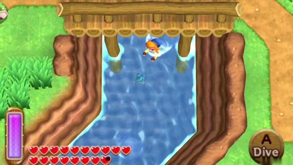 Link swimming in a river between brown cliffs toward a wooden bridge, with the Dive prompt showing Link swimming in a river between brown cliffs toward a wooden bridge, with the Dive prompt showing