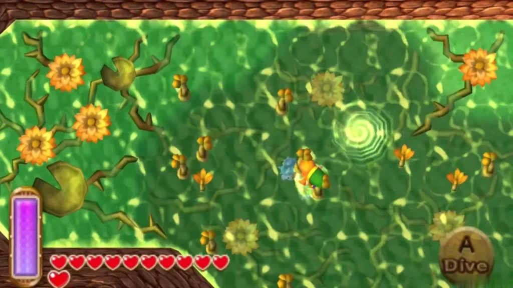 Link swimming in deep green swamp water among orange flowers with the Dive prompt showing, a swirl of water beside him Link swimming in deep green swamp water among orange flowers with the Dive prompt showing, a swirl of water beside him