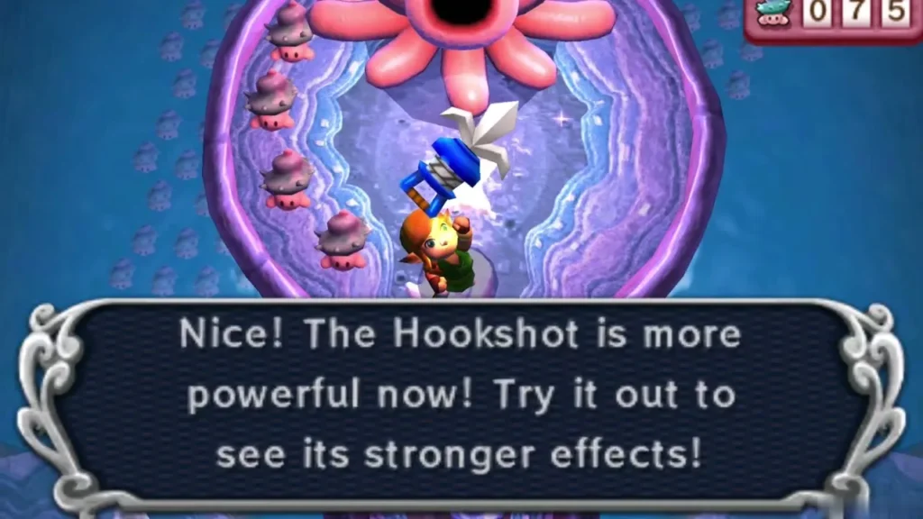 Hookshot upgrade box saying the hookshot is more powerful, with Link holding it up