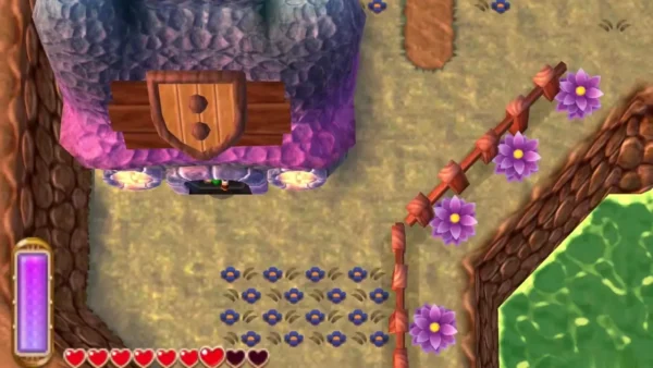 Lakeside Item Shop with its purple stone front and wooden door, flower-lined path and cliff wall to the south