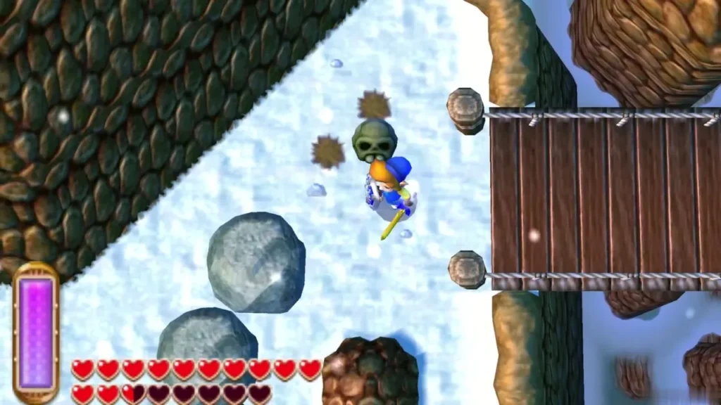 Link in the snow beside two large grey rocks and a wooden rope bridge, a skull lying nearby Link in the snow beside two large grey rocks and a wooden rope bridge, a skull lying nearby