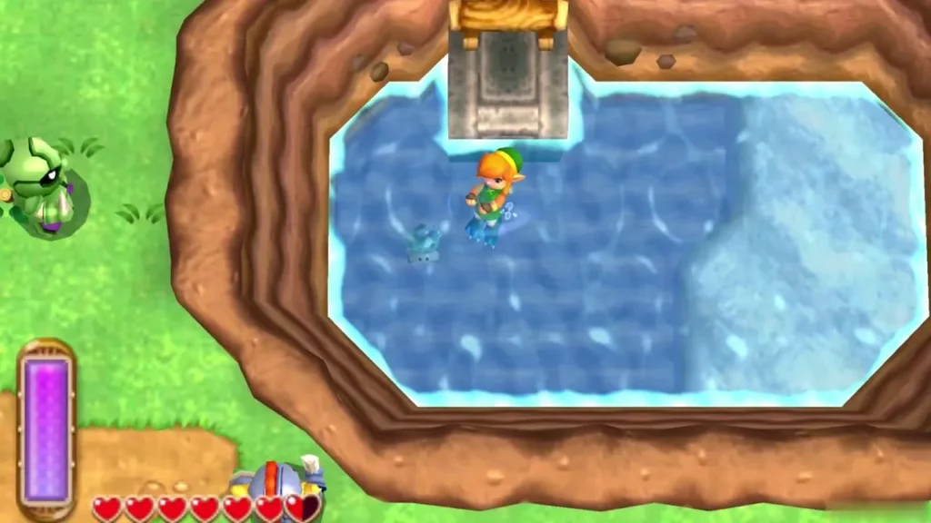 Link swimming in a small pond ringed by cliffs, a lost Maiamai in the water beside him Link swimming in a small pond ringed by cliffs, a lost Maiamai in the water beside him
