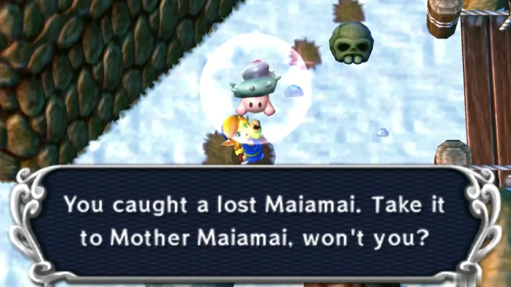 Link holding up a caught lost Maiamai in a bubble in the snow beside a large rock and a skull, the catch message complete Link holding up a caught lost Maiamai in a bubble in the snow beside a large rock and a skull, the catch message complete