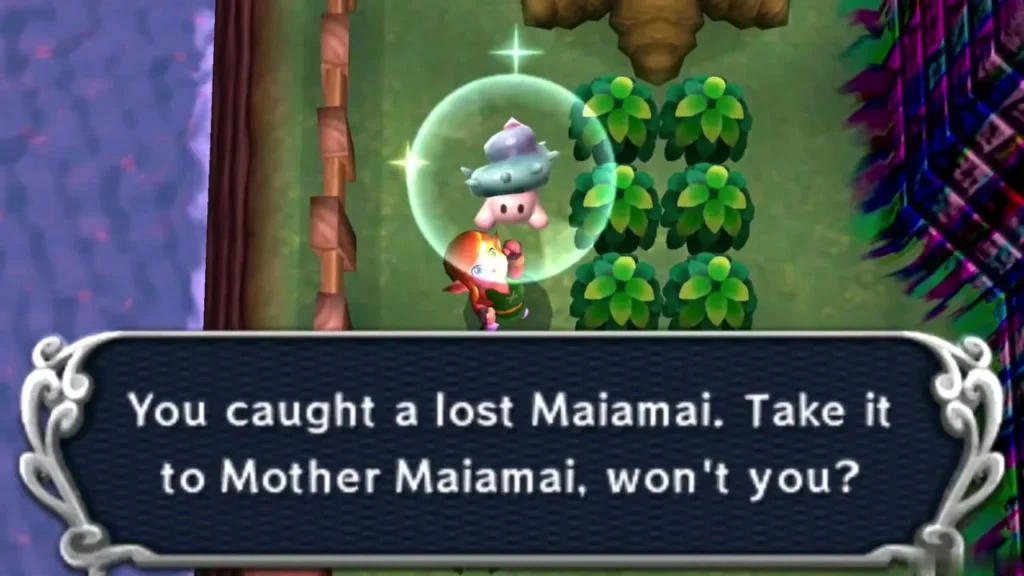 Link holding up a caught lost Maiamai in a bubble on the strip beside the castle wall, the catch message complete Link holding up a caught lost Maiamai in a bubble on the strip beside the castle wall, the catch message complete