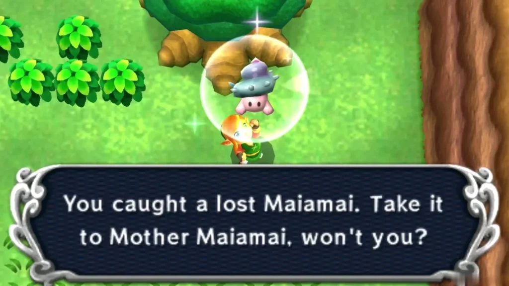 Link holding up a lost Maiamai in a bubble beside a tree and bushes at the foot of a brown cliff Link holding up a lost Maiamai in a bubble beside a tree and bushes at the foot of a brown cliff