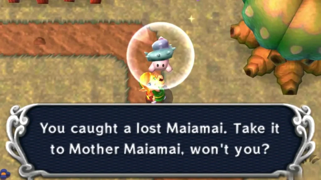 Link holding up a caught lost Maiamai in a bubble beside a round tree and an orange cliff, the catch message complete Link holding up a caught lost Maiamai in a bubble beside a round tree and an orange cliff, the catch message complete