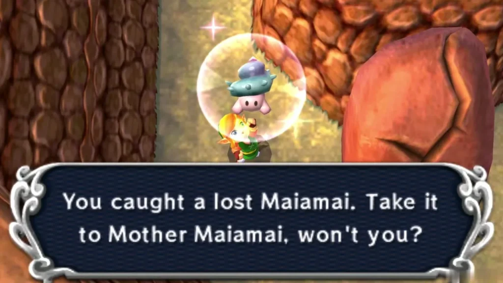 Link holding up a caught lost Maiamai in a bubble beside a cracked red rock, the catch message complete Link holding up a caught lost Maiamai in a bubble beside a cracked red rock, the catch message complete