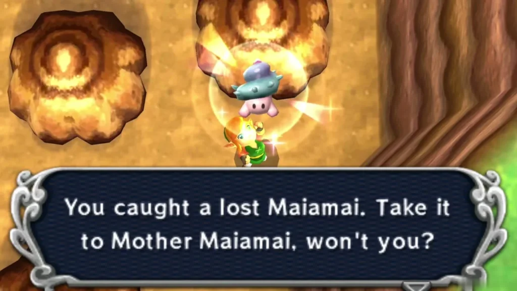 Link holding up a lost Maiamai in a bubble beside round brown rock formations on sandy ground Link holding up a lost Maiamai in a bubble beside round brown rock formations on sandy ground