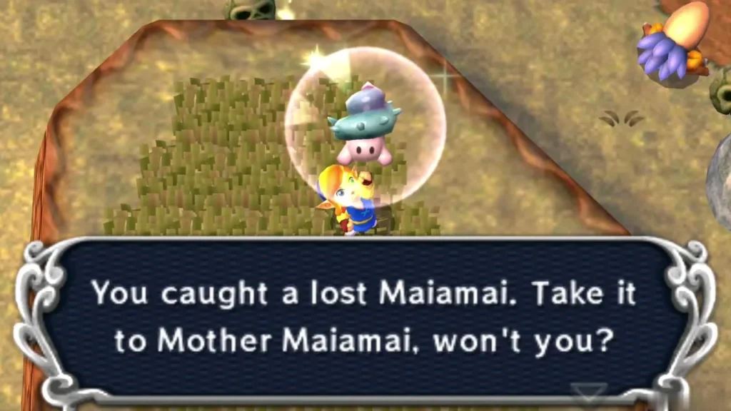 Link holding up a caught lost Maiamai in a bubble beside a cut grass patch on a plateau in Lorule, the catch message complete Link holding up a caught lost Maiamai in a bubble beside a cut grass patch on a plateau in Lorule, the catch message complete