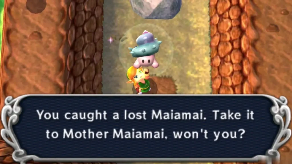 Link holding up a caught lost Maiamai in a bubble in a canyon lane lined with large rocks, the catch message complete Link holding up a caught lost Maiamai in a bubble in a canyon lane lined with large rocks, the catch message complete