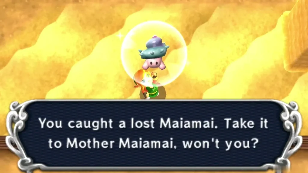 Link holding up a caught lost Maiamai in a bubble among golden sand dunes in the Hyrule desert, message complete Link holding up a caught lost Maiamai in a bubble among golden sand dunes in the Hyrule desert, message complete