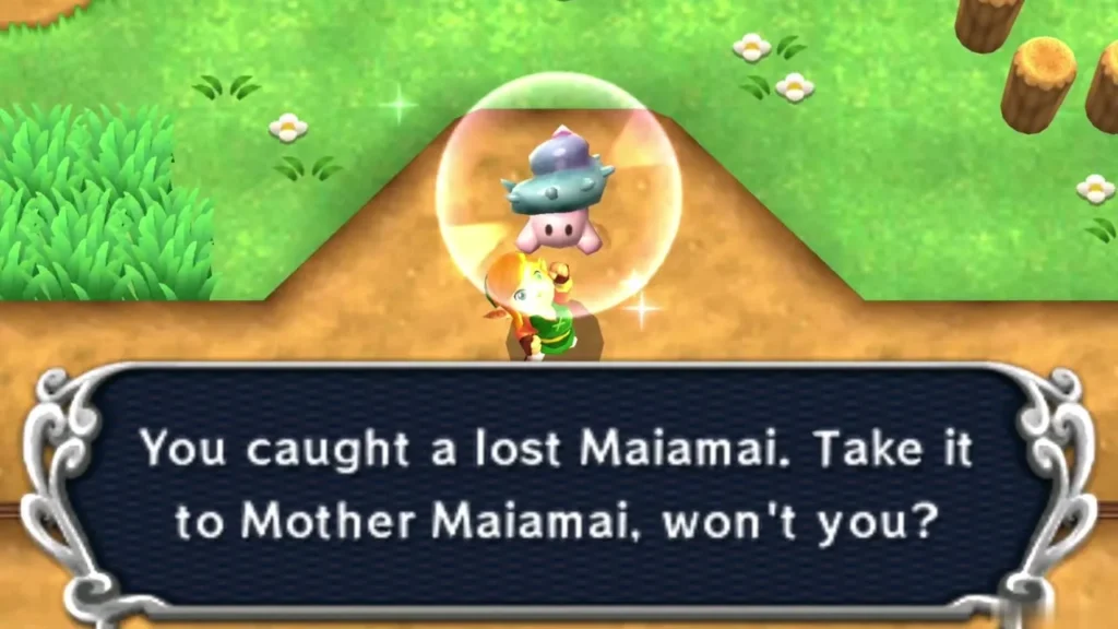Link holding up a caught lost Maiamai in a bubble on a dirt ledge above green grass, the catch message complete Link holding up a caught lost Maiamai in a bubble on a dirt ledge above green grass, the catch message complete