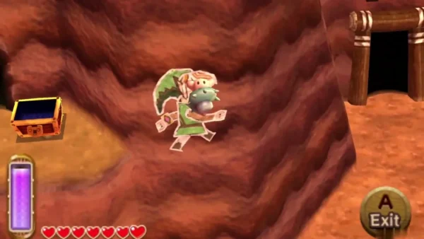 Link merged into a red cliff wall to the right of a treasure chest, a lost Maiamai held against him