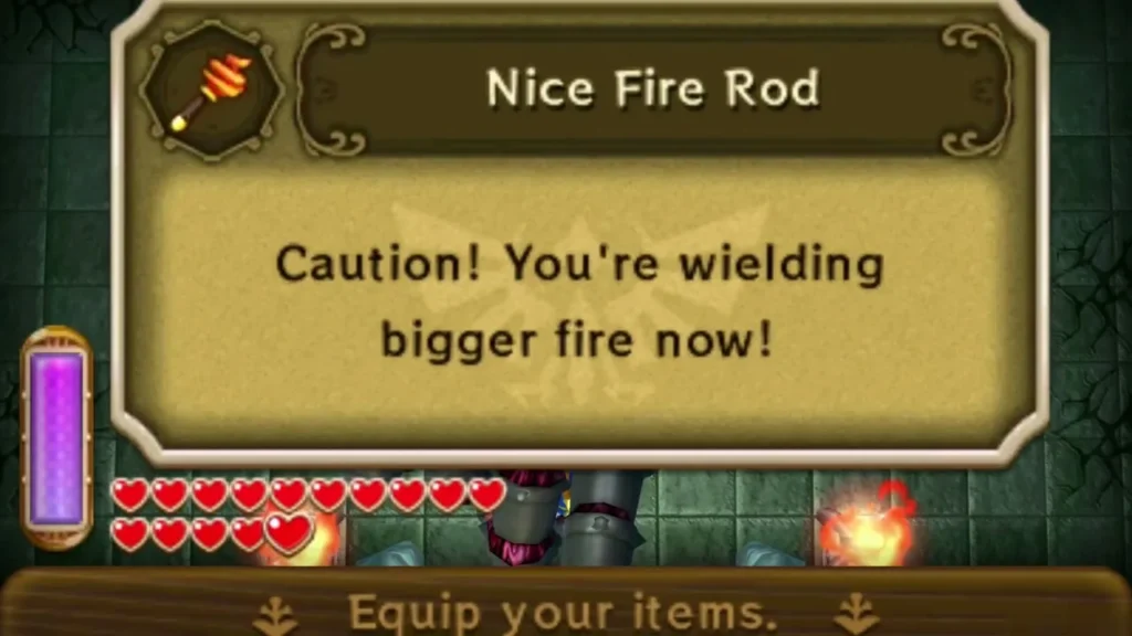 Nice Fire Rod item box saying Link is wielding bigger fire in a green dungeon room