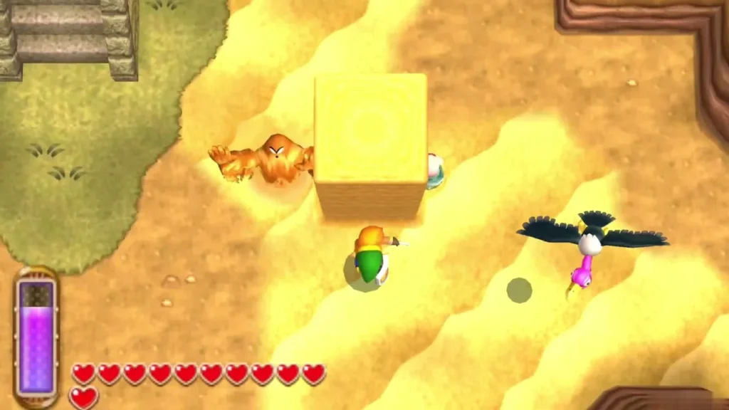 Link with a freshly raised sand pillar in the desert, a lost Maiamai beside it, with a Geldman and a vulture nearby Link with a freshly raised sand pillar in the desert, a lost Maiamai beside it, with a Geldman and a vulture nearby