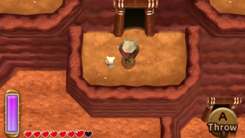 Link carrying a small rock on a Death Mountain ledge outside a wooden doorway, a lost Maiamai beside him Link carrying a small rock on a Death Mountain ledge outside a wooden doorway, a lost Maiamai beside him