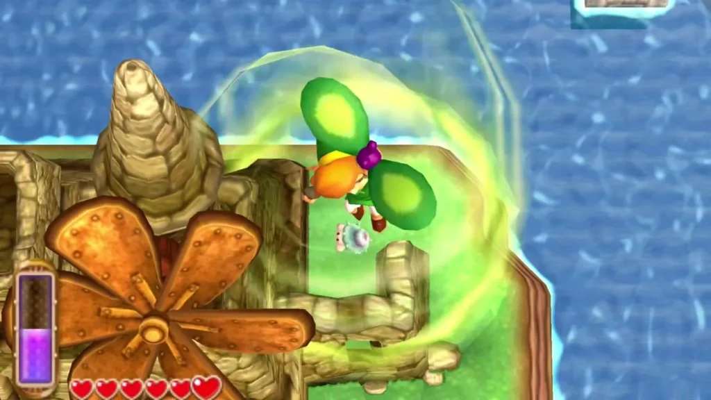 Link riding a green gust above the stone panel behind the House of Gales as a Maiamai drops beside him Link riding a green gust above the stone panel behind the House of Gales as a Maiamai drops beside him