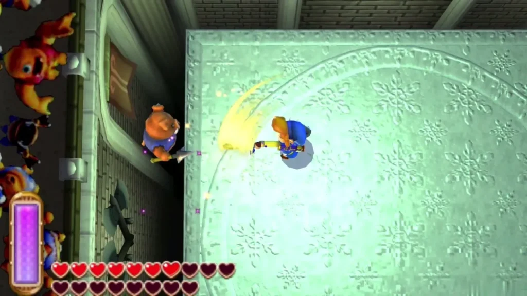 Link fighting enemies on an icy floor of the Intermediate course