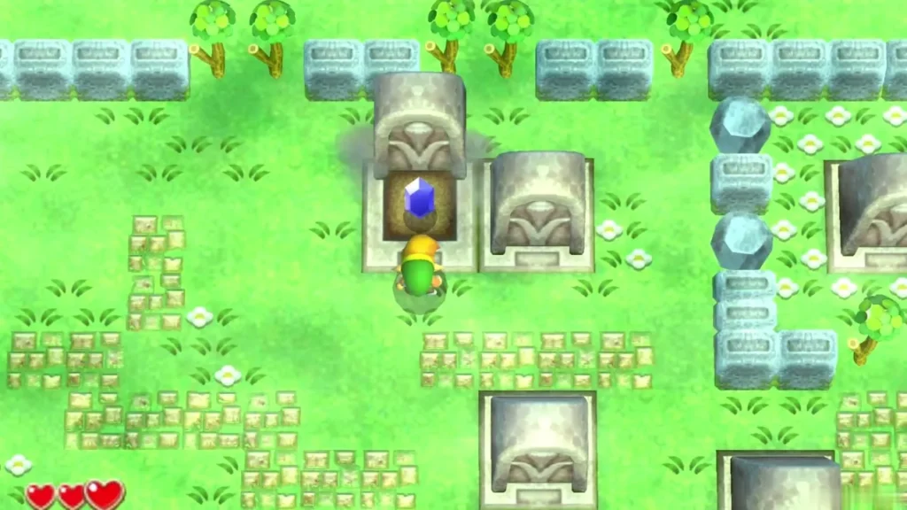 Pushed-aside gravestone revealing a dark opening in the Graveyard, with a blue Rupee at its entrance Pushed-aside gravestone revealing a dark opening in the Graveyard, with a blue Rupee at its entrance