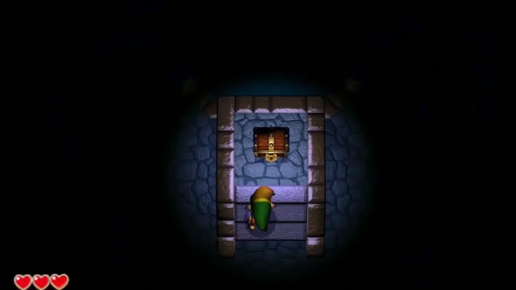 Link beside a chest in a dark stone room, lit by a small circle of light Link beside a chest in a dark stone room, lit by a small circle of light