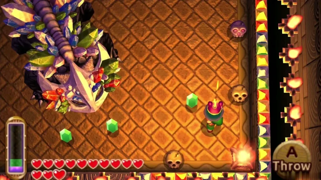 Link throws a Bomb at the Gemesaur King in the boss room Link throws a Bomb at the Gemesaur King in the boss room