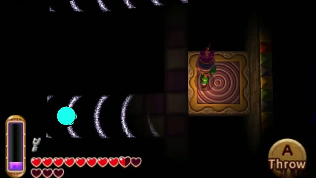 Link on the moving platform about to throw a Bomb down a ramp in the Big Key room Link on the moving platform about to throw a Bomb down a ramp in the Big Key room