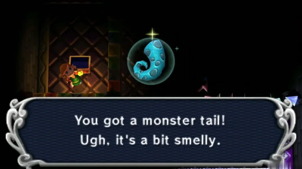 Link holding up a Monster Tail under the 'You got a monster tail!' message box Link holding up a Monster Tail under the 'You got a monster tail!' message box