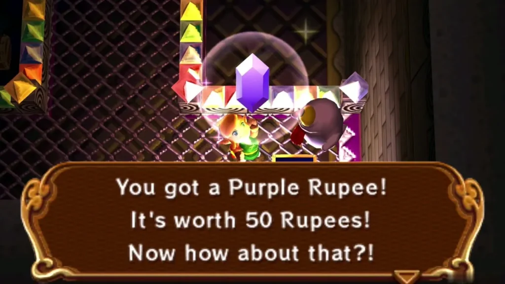 Link holding up a Purple Rupee under the 'worth 50 Rupees' message box Link holding up a Purple Rupee under the 'worth 50 Rupees' message box