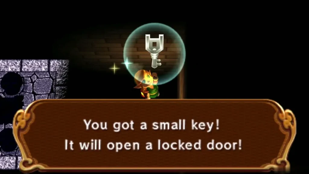 Link holding up a small key under the 'You got a small key!' message box Link holding up a small key under the 'You got a small key!' message box