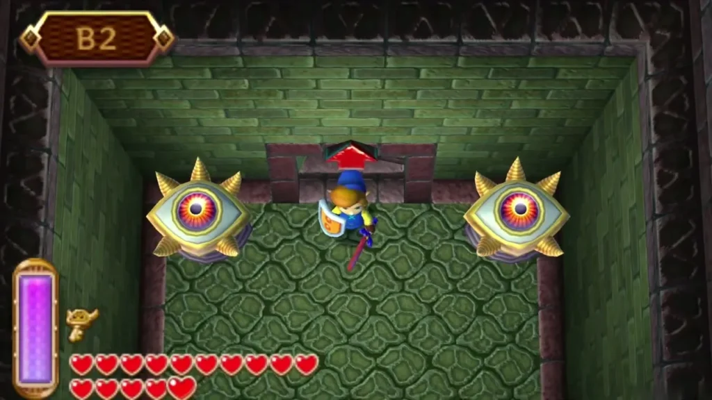 Link at the B2 boss door between two spiked eye statues Link at the B2 boss door between two spiked eye statues