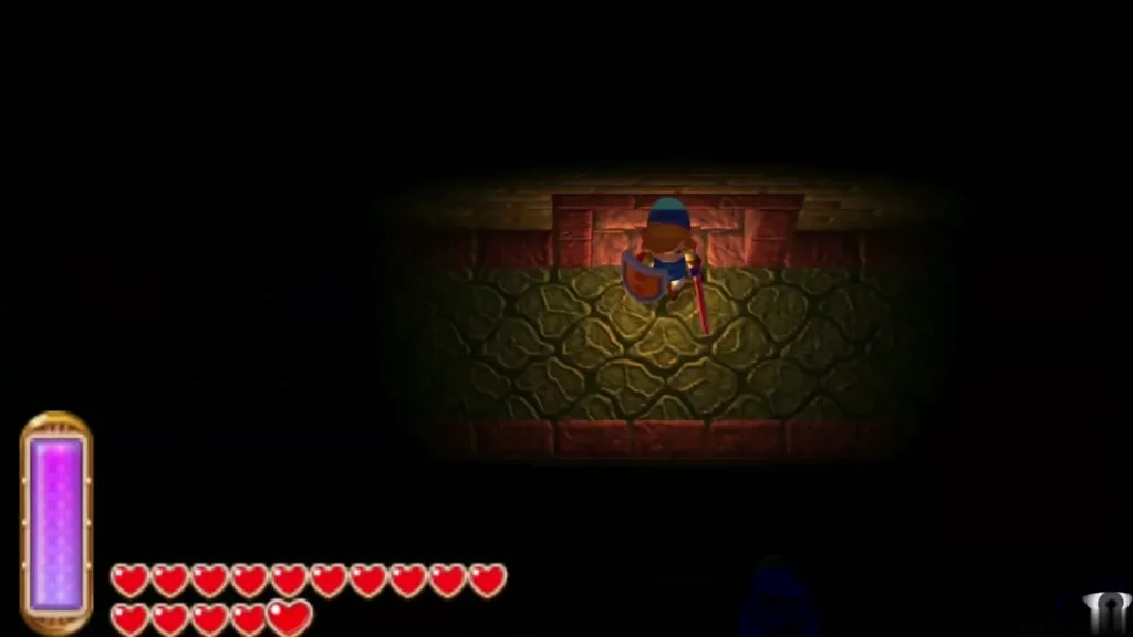 Link in a dark Skull Woods room, lit only by the Lamp's glow Link in a dark Skull Woods room, lit only by the Lamp's glow