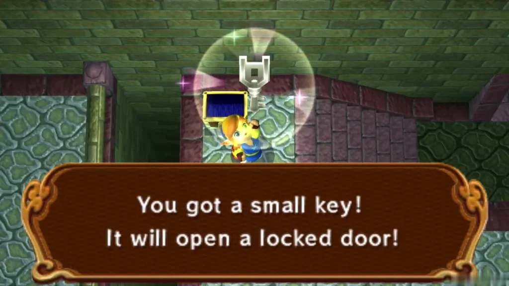 Link holding up the first Small Key with the message box showing Link holding up the first Small Key with the message box showing