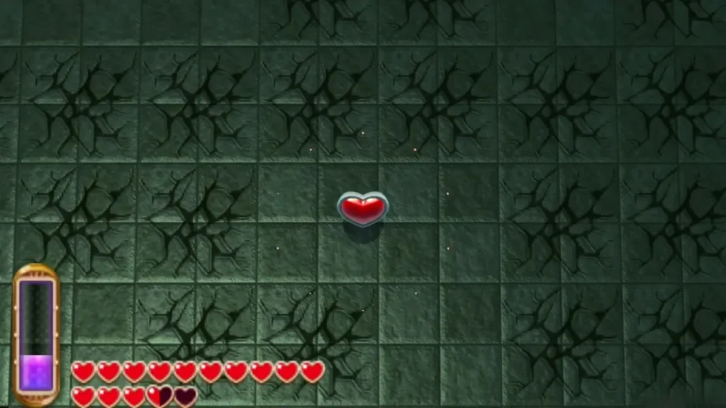 A heart drop lies on the arena floor after the Knucklemaster falls A heart drop lies on the arena floor after the Knucklemaster falls