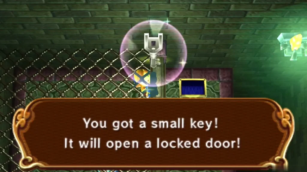 Link raising a small key with the You got a small key message box on screen Link raising a small key with the You got a small key message box on screen