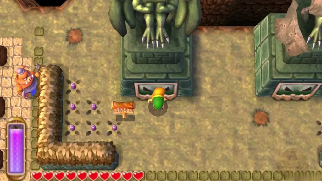 Link stands at the base of the gargoyle statue in Thieves' Town Link stands at the base of the gargoyle statue in Thieves' Town