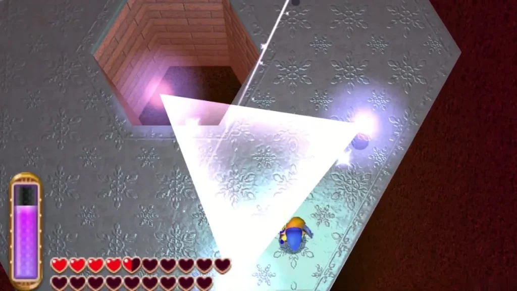 Link running across the icy platform inside a white triangle of ice orbs Link running across the icy platform inside a white triangle of ice orbs