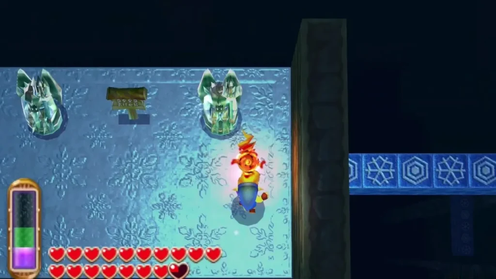 Link with the Fire Rod in a blaze beside two ice statues on the cavern floor Link with the Fire Rod in a blaze beside two ice statues on the cavern floor