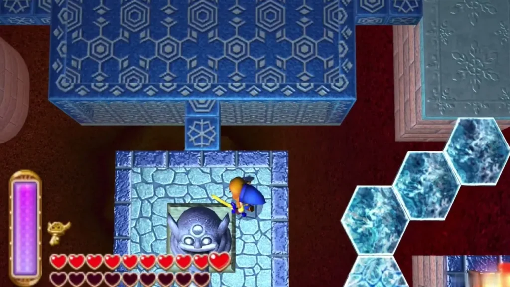 Link beside a stone statue set into an alcove of the ice ruins Link beside a stone statue set into an alcove of the ice ruins