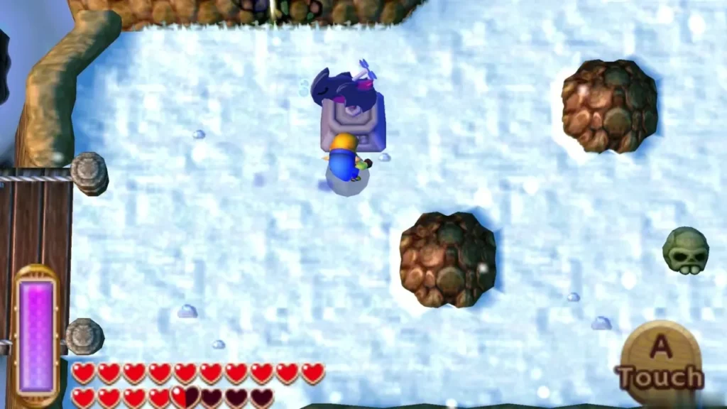 Link steps up to the weather vane in the snow, where the Touch prompt appears Link steps up to the weather vane in the snow, where the Touch prompt appears