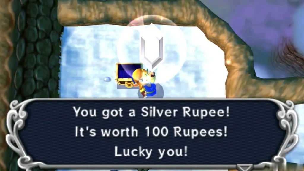 Link holding up a Silver Rupee beside the open chest, with the message that it is worth 100 Rupees Link holding up a Silver Rupee beside the open chest, with the message that it is worth 100 Rupees