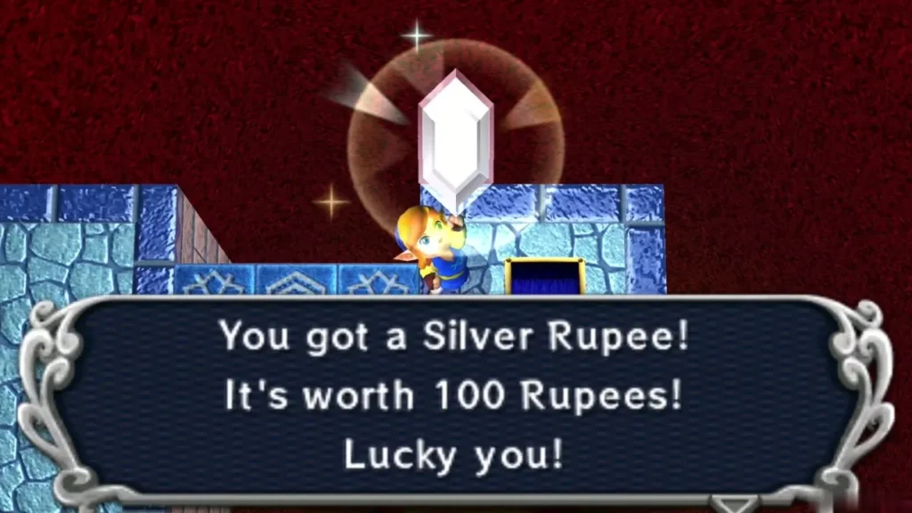 Link holds up a Silver Rupee with the 'You got a Silver Rupee!' box Link holds up a Silver Rupee with the 'You got a Silver Rupee!' box