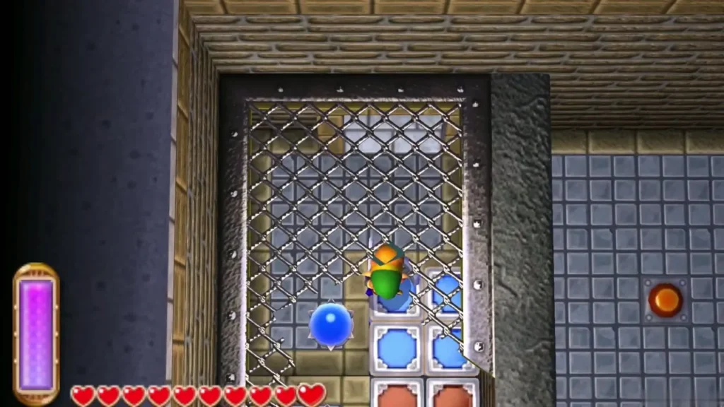Link inside a grated cage room in B2 with a blue bomb beside him Link inside a grated cage room in B2 with a blue bomb beside him