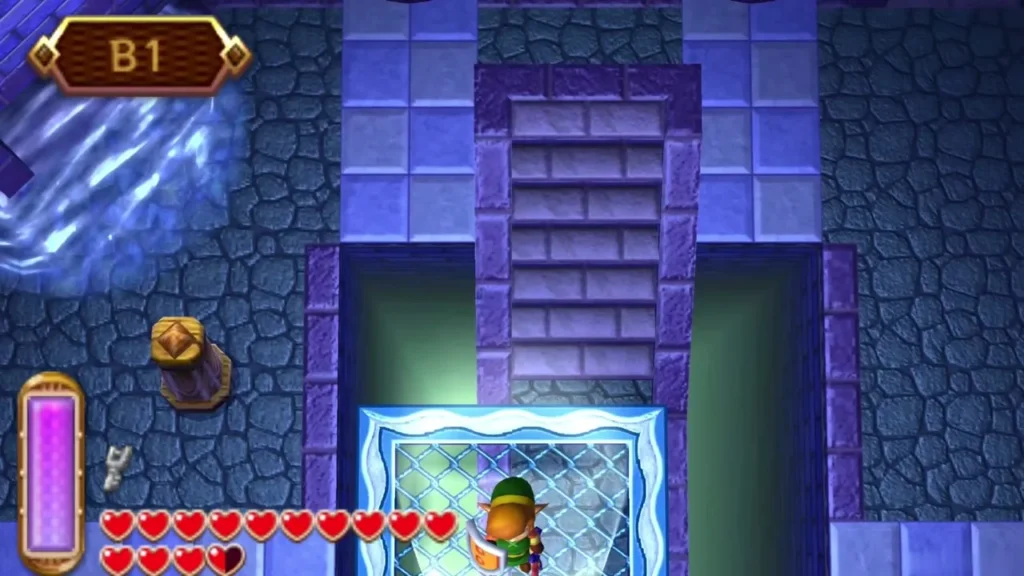 Link at a barred grate in B1 next to a closed treasure chest Link at a barred grate in B1 next to a closed treasure chest
