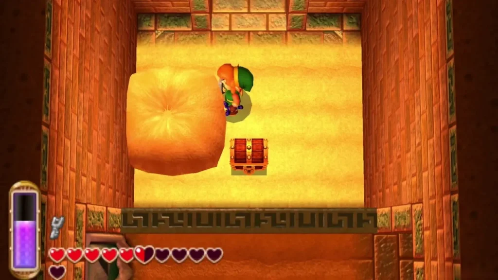 A red chest sits beside the boulder in the sand room, with Link nearby A red chest sits beside the boulder in the sand room, with Link nearby