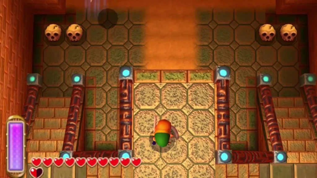 Link standing in the sandy Desert Palace entrance hall between skull pots and stone pillars Link standing in the sandy Desert Palace entrance hall between skull pots and stone pillars
